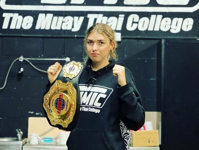 Georgia Ralphs with the ISKA 60kg Queensland championship belt.