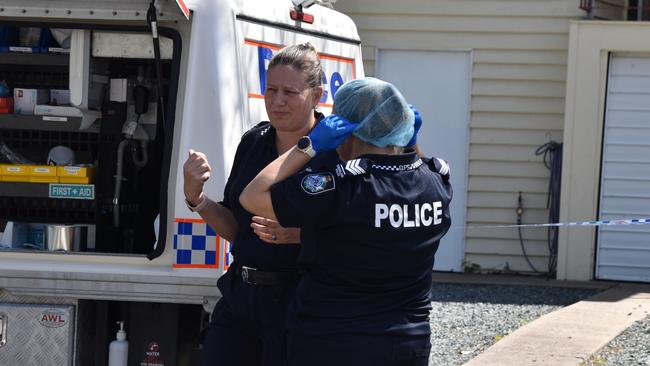 Forensic officers at the scene of the alleged murder on Bean St, Park Avenue on Friday August 11.