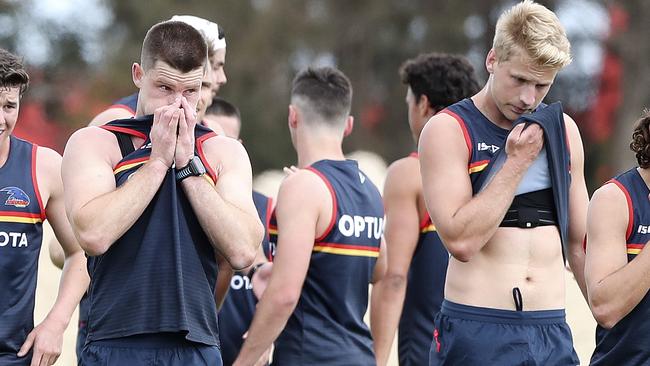 Bryce Gibbs (left) shows the strain of a return to pre-season training, alongside new Crows recruit Billy Frampton. Picture: Sarah Reed.