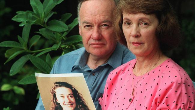 Roger and Joy Membrey in the 1990s with a photograph of their daughter Elisabeth.