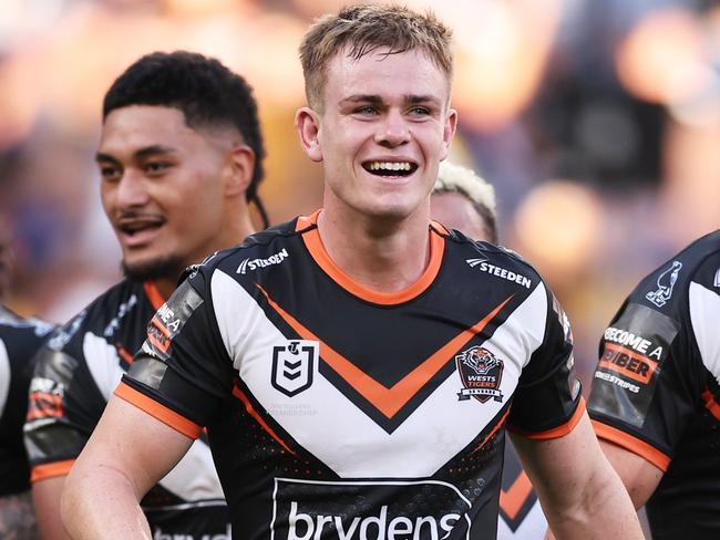 SYDNEY, AUSTRALIA - APRIL 01:  Lachlan Galvin of the Tigers celebrates victory with team mates after the round four NRL match between Parramatta Eels and Wests Tigers at CommBank Stadium, on April 01, 2024, in Sydney, Australia. (Photo by Matt King/Getty Images)