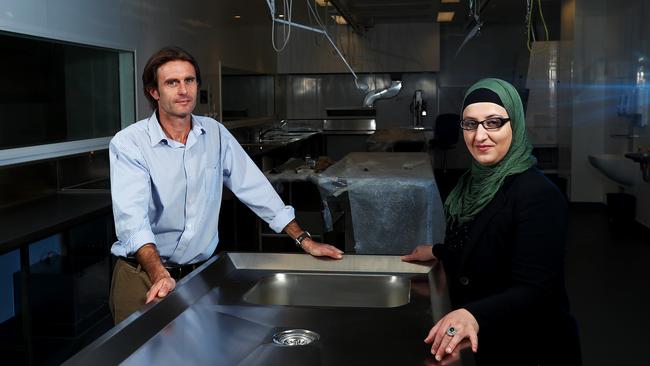 RAH Mortuary Head of Unit Stephen Nygaard with Dzenita Muratovic in the nRAH morgue theatre.