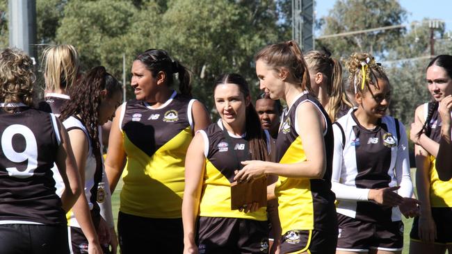 Best on ground for the Over-23s Lara Harding (centre) mingles with the senior and junior women’s teams. Picture: Gera Kazakov