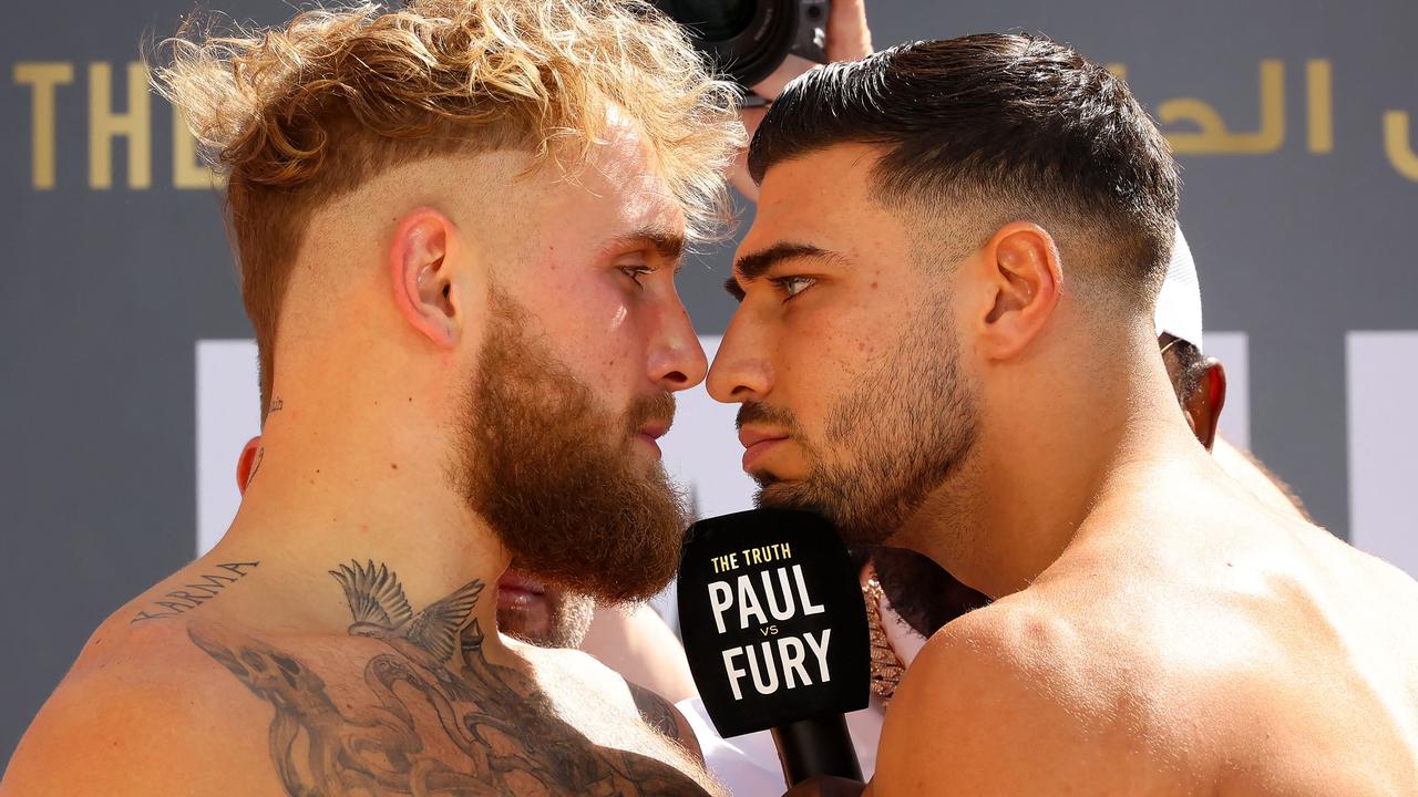 Tommy Fury and Jake Paul will finally come to blows on Monday. (Photo by Fayez Nureldine / AFP)