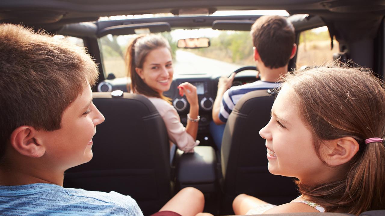 CarsGuide - a generic photo of a family in a car. Picture: iStock