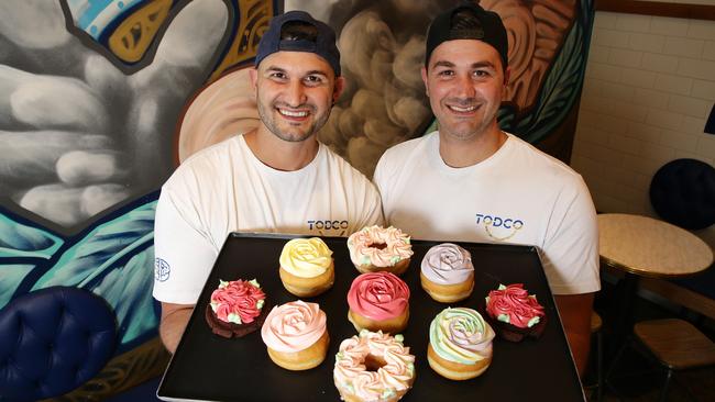 Nic and Yani Kabylakis with their special Valentines Day doughnuts. Picture Andrew Tauber