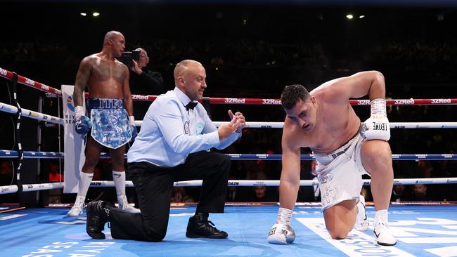 Justis Huni struggled to his feet but the referee stopped the fight. (Photo by Richard Pelham/Getty Images)