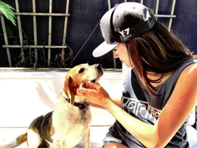 Animal-lover, Meghan, with her beloved Beagle, Guy. Picture: Instagram