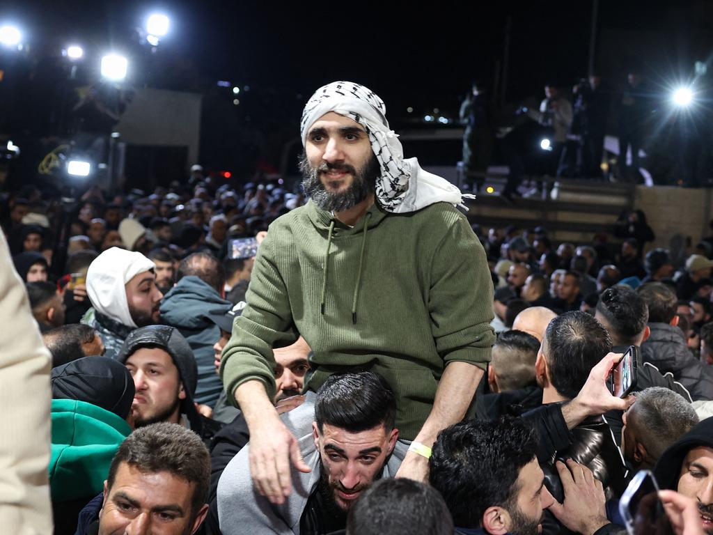 Former Palestinian prisoners, released as part of the seventh hostage-prisoner exchange, are welcomed by relatives upon arrival in the occupied West Bank city of Ramallah. Picture: AFP