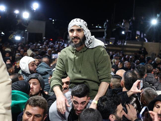 Former Palestinian prisoners, released as part of the seventh hostage-prisoner exchange, are welcomed by relatives upon arrival in the occupied West Bank city of Ramallah. Picture: AFP