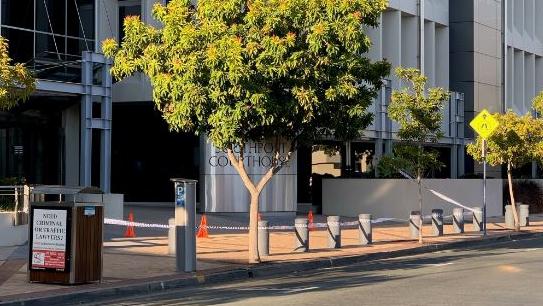 Southport Magistrates Courthouse wrapped in police tape.