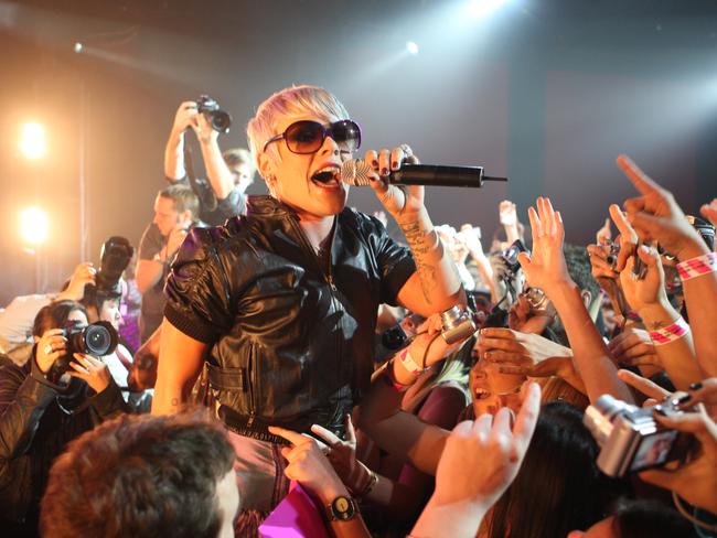 Pink jumps into the crowd while performing during her concert at the Metro Theatre in Sydney. Picture: Supplied