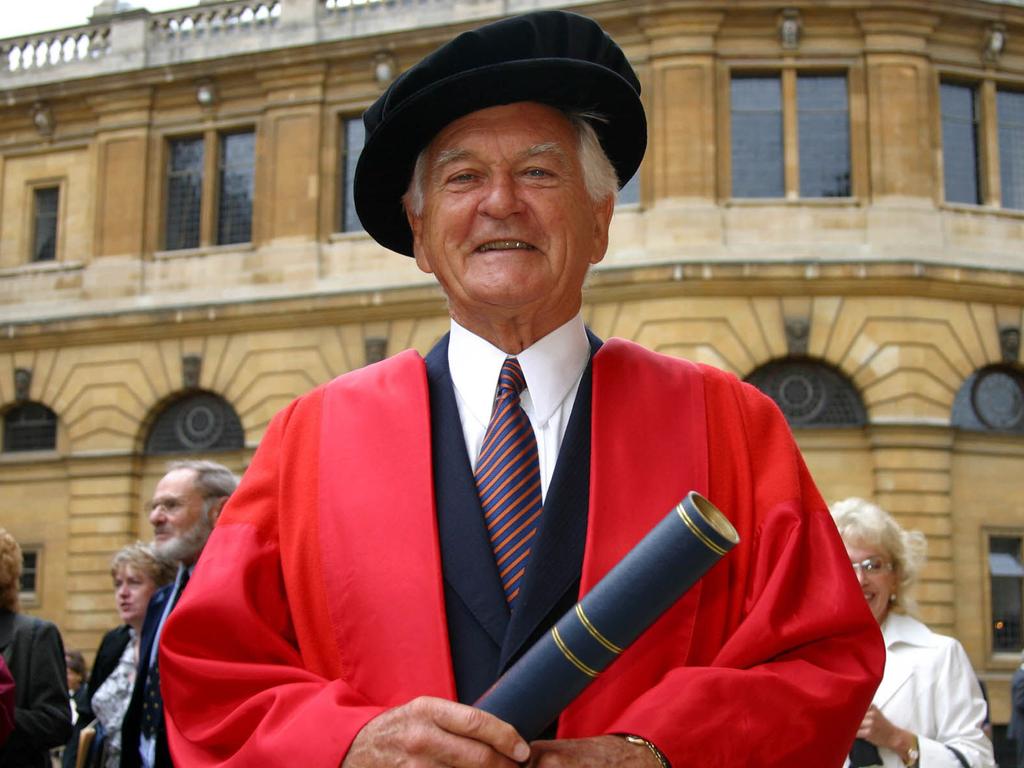 Rhodes Scholas former Australian Prime Minister Robert Hawke with his honorary degree, awarded by Oxford University, in front of the Sheldonian Theatre, Oxford, England in 2003.