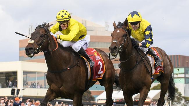 Without A Fight and Mark Zahra (left) edge in front of West Wind Blows and Jamie Spencer. Picture: Vince Caligiuri/Getty Images