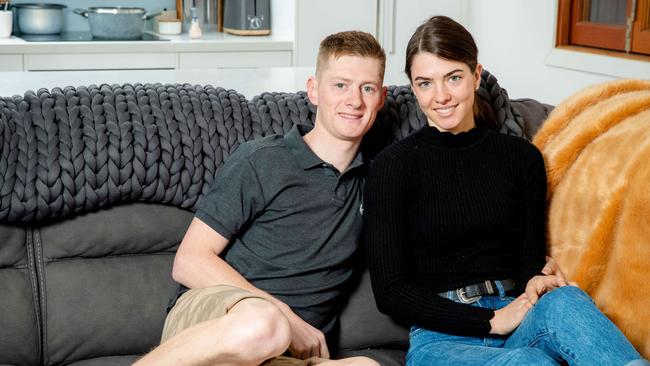 Jockeys Kyle Wilson-Taylor and Angela Jones at their Brisbane home in 2022. Picture: Richard Walker