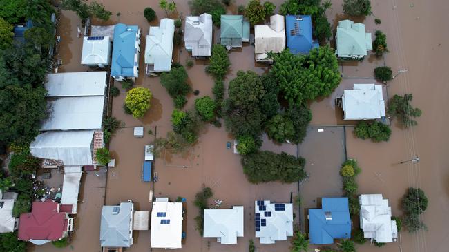 Houses are surrounded by floodwater on March 31, 2022 in Lismore. Picture: Dan Peled/Getty Images.