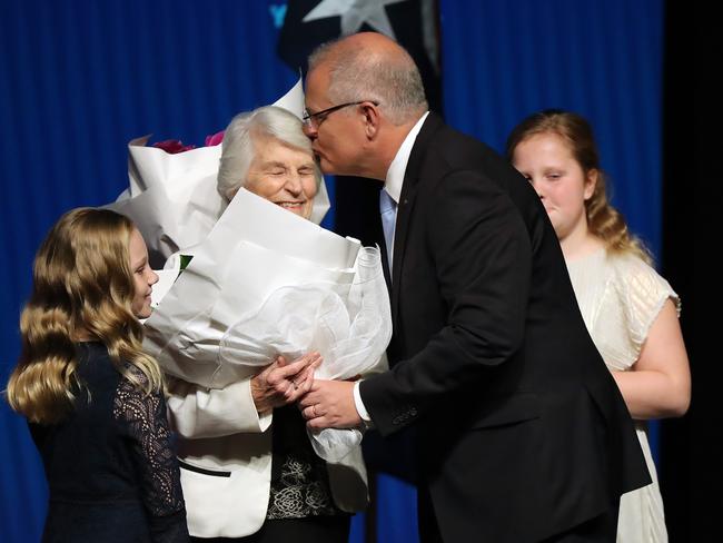 Flowers and a kiss for mother Marion Morrison at the campaign launch. Picture: Alex Coppel.