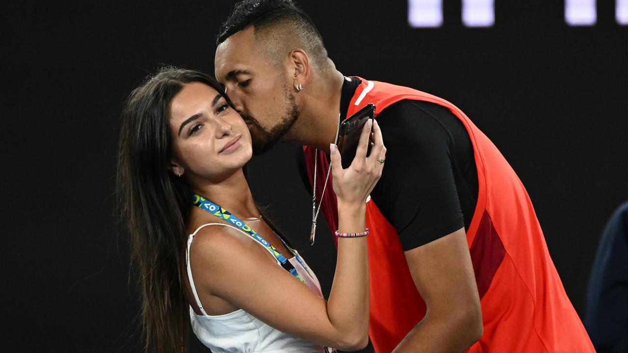 Nick Kyrgios kisses his girlfriend Costeen Hatzi after winning his doubles final. Photo by Quinn Rooney/Getty Images.