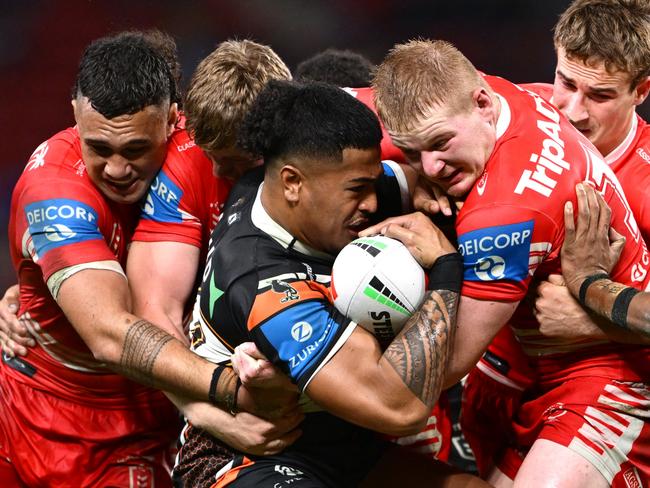 BRISBANE, AUSTRALIA - MAY 03: Fonua Pole of the Tigers charges forward during the round nine NRL match between Wests Tigers and St George Illawarra Dragons at Suncorp Stadium, on May 03, 2025, in Brisbane, Australia. (Photo by Hannah Peters/Getty Images)