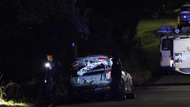 A burnt out car on Annette Street in Oatley. Picture: Jonathan Ng