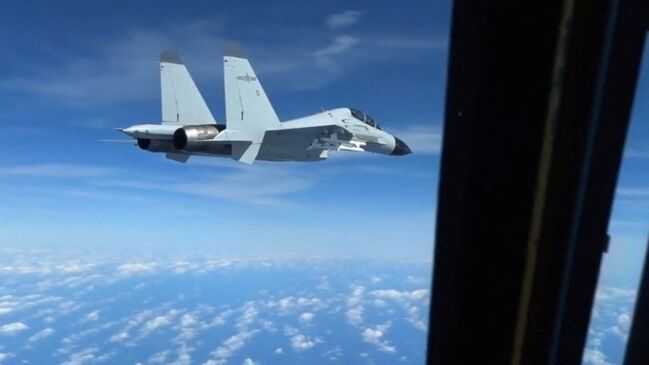 Watch: Chinese Jet Fighter Intercepts U.S. Spy Plane