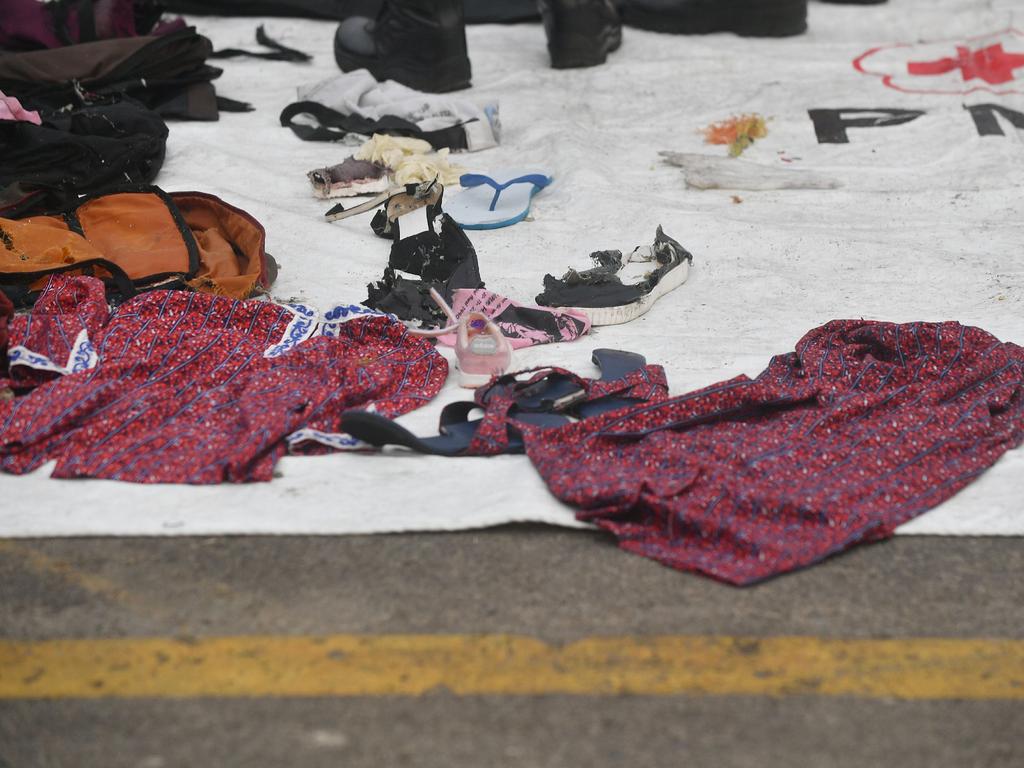 A Lion Air flight attendant’s uniform is displayed among debris of the ill-fated Lion Air flight JT 610 in Jakarta. Picture: Adek Berry/AFP