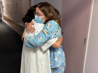 Kirsty Bryant embraces mother Michelle Hayto. Image: Via ABC.net.au