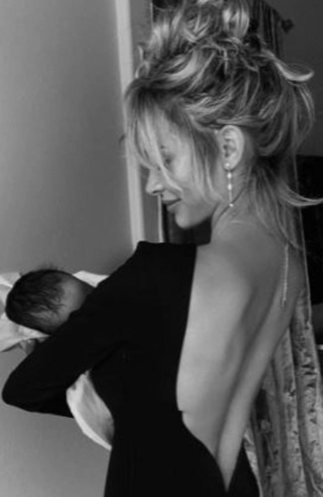 Scott cradling her and Cannon’s newborn boy, Zen. Picture: Instagram