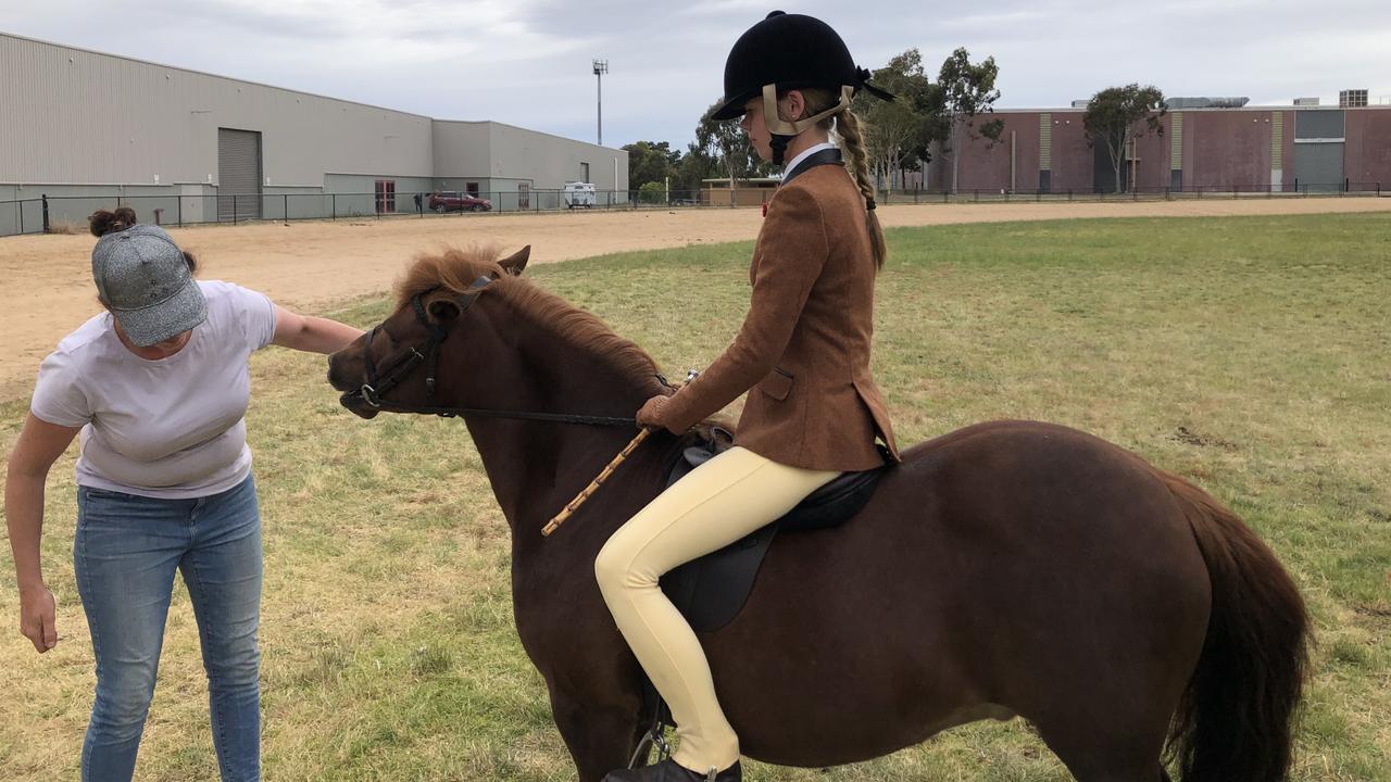 Alice Mooney, 16, with her mother Lisa Mooney, and pony Cleoranee Inspector.