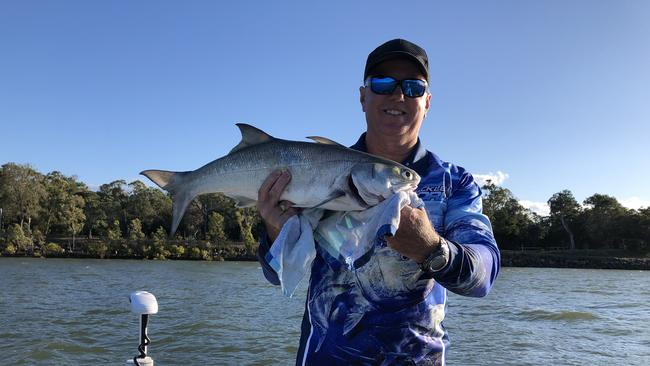 Shane Anderson with the 67cm blue salmon he caught in the Burnett River last weekend.