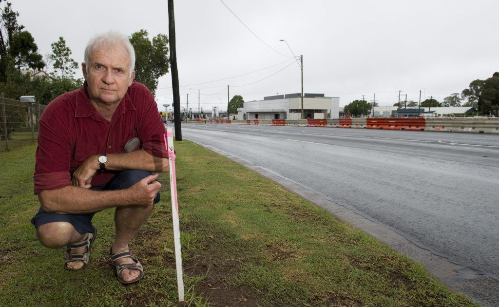 Neil Riethmuller lives opposite the McDonalds development on the corner of Davis St and Anzac Av (between James and Tor Sts) and will loose some of his footpath in the road widening process. . Picture: Kevin Farmer