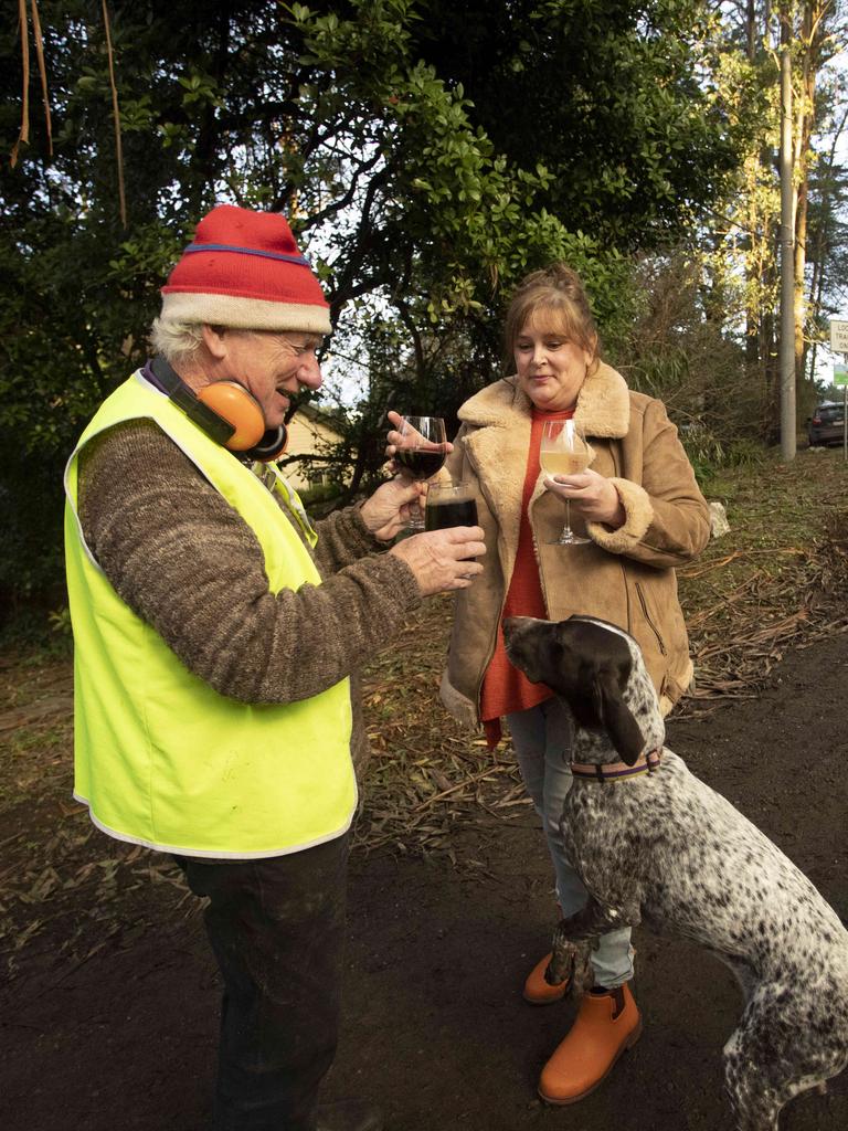 Another resident Vanessa gives neighbour Barry a drink. Picture: Arsineh Houspian