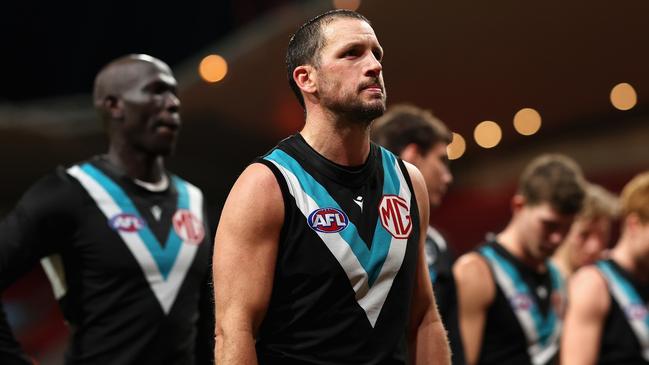 SYDNEY, AUSTRALIA - JUNE 16: Travis Boak of the Power and team mates look dejected after losing the round 14 AFL match between Greater Western Sydney Giants and Port Adelaide Power at ENGIE Stadium, on June 16, 2024, in Sydney, Australia. (Photo by Cameron Spencer/Getty Images)