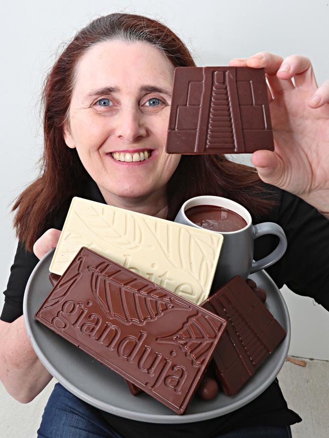 Annette Muller with some of 17 Rocks’ “cave man” chocolates. Picture: Annette Dew