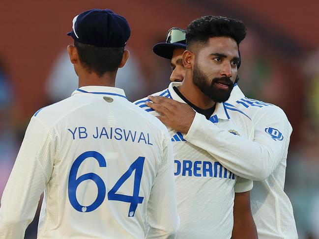 ADELAIDE, AUSTRALIA - DECEMBER 07: Mohammed Siraj of India celebrates with teammates after dismissing Mitchell Starc of Australia during day two of the Men's Test Match series between Australia and India at Adelaide Oval on December 07, 2024 in Adelaide, Australia. (Photo by Robert Cianflone/Getty Images)