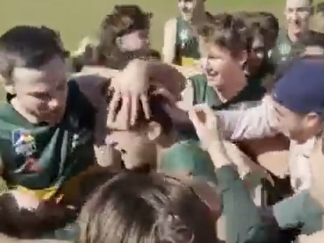 Watch: Fans storm oval for 100th goal celebrations