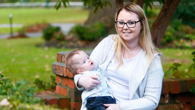 Penguin mother Maddison Murdoch and her son Lawson Troughton, who at three months old was given three days to live by doctors. Picture: PATRICK GEE