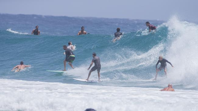Surfers enjoying the larger swell at Snapper Rocks on Sunday 2 January 2022. Picture: Jerad Williams