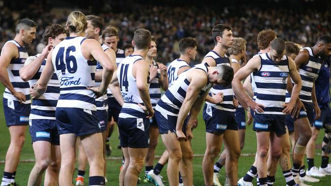 Dejected Geelong players after losing to Collingwood. Pic: Michael Klein.