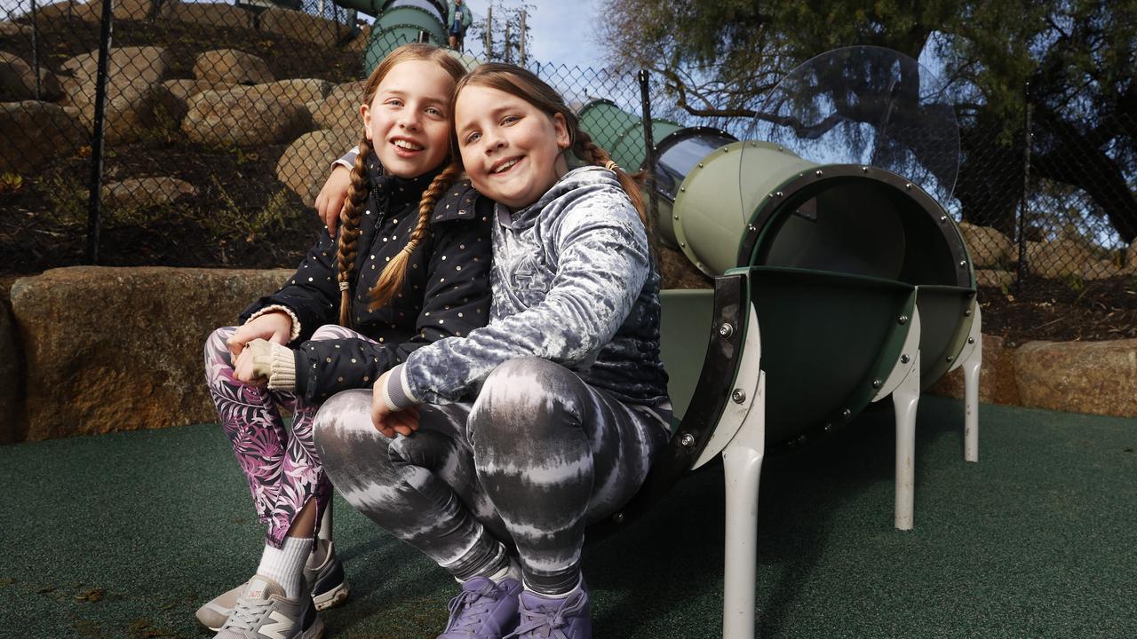 Sisters’ persistence pays off after $140k new slide opens