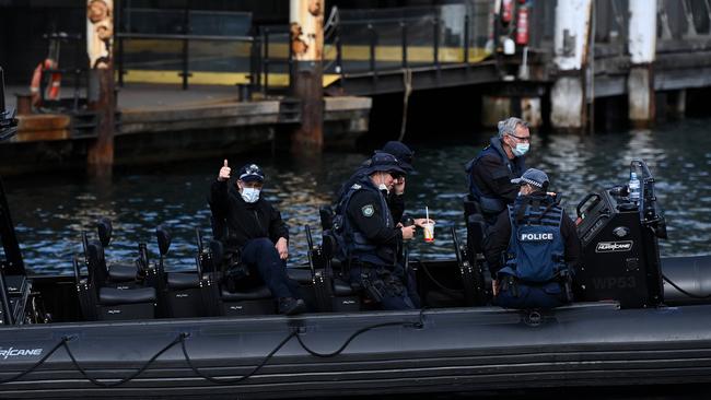 NSW Water Police officers patrol the Circular Quay ferry terminal. Picture: NCA NewsWire/Bianca De Marchi