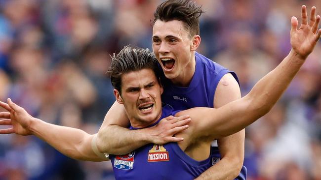 Before he was involved in this iconic AFL picture, McLean was turning heads at Kalora Park. (Photo by Adam Trafford/AFL Media/Getty Images)