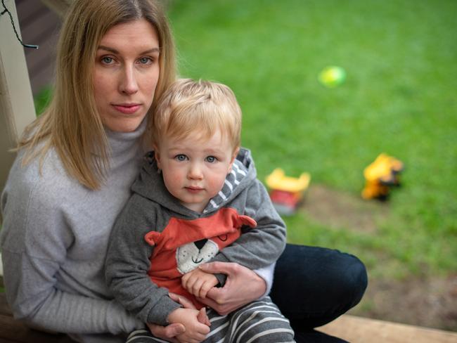 Domenique Szantyr, 35, and son Lachlan, 2, are trying to get to South Australia to her terminally ill mother. Picture: Jason Edwards