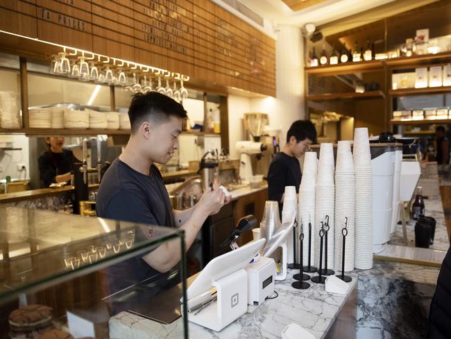 SYDNEY, AUSTRALIA - NewsWire Photos JULY 1, 2022: Workers at Regiment Cafe CBD on Friday. Picture: NCA NewsWire / Nikki Short