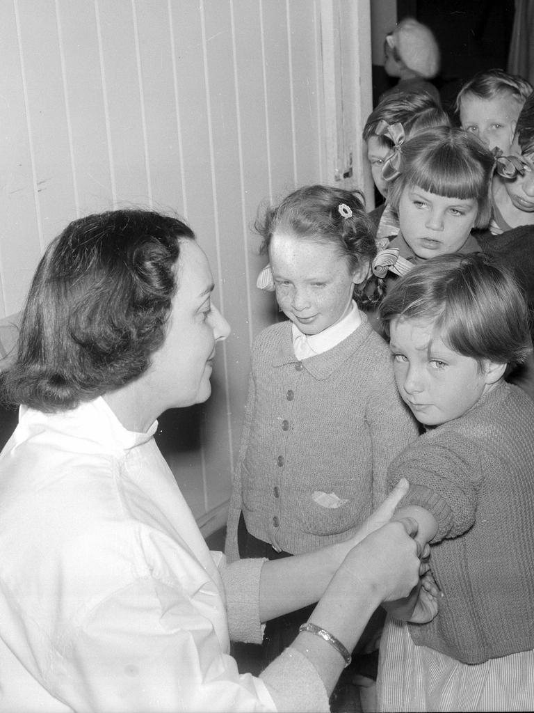 Dr Marie Norton-Wilson giving Salk vaccinations in 1957. Picture: Eric Donnelly