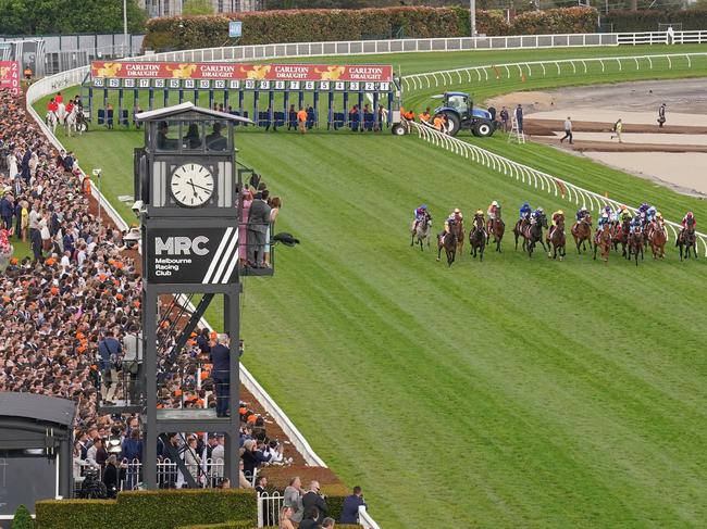 Horses jump from the barriers during the running of the Carlton Draught Caulfield Cup at Caulfield Racecourse on October 15, 2022 in Caulfield, Australia. (Photo by Scott Barbour/Racing Photos via Getty Images)