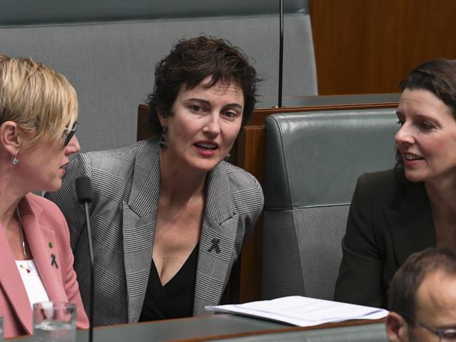 CANBERRA, AUSTRALIA - DECEMBER 15: Teals Zoe Daniel , Kate Chaney and Allegra Spender during the Treasury Laws Amendment (Energy Price Relief Plan) Bill in the House of Representatives at Parliament House in Canberra. Picture: NCA NewsWire / Martin Ollman