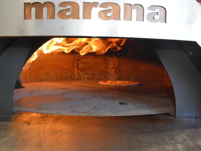 PIZZA PLEASES: The business owner said the Marana pizza oven creates a perfect, even char on the crust. Picture: Rhylea Millar