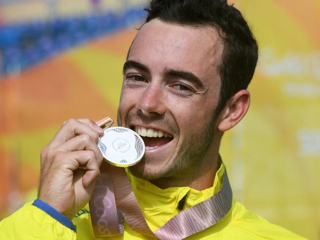 Silver medalist Jacob Birtwhistle of Australia during the medal ceremony for the Men's Triathlon at the XXI Commonwealth Games at Southport Broadwater Parklands, on the Gold Coast, Thursday, April 5, 2018. (AAP Image/Dean Lewins) NO ARCHIVING, EDITORIAL USE ONLY