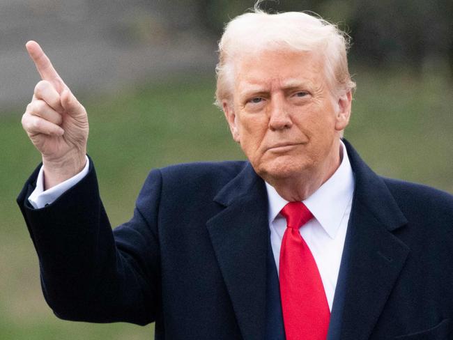 US President Donald Trump walks to board Marine One at the South Lawn of the White House in Washington, DC on March 14, 2025. Trump is spending the weekend at his Florida Mar-a-Lago resort. (Photo by ROBERTO SCHMIDT / AFP)